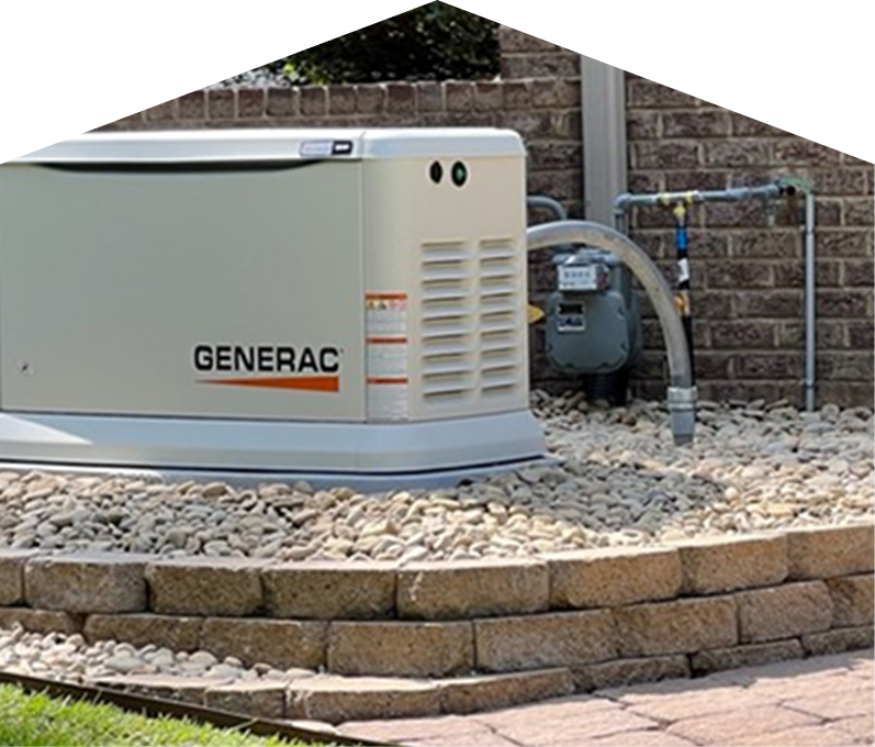 Generac standby generator installed by Romaniuk on a raised stone platform beside a brick wall, connected to a natural gas meter for backup power supply. Generac standby generator installed by Romaniuk on a raised stone platform beside a brick wall, connected to a natural gas meter for backup power supply.